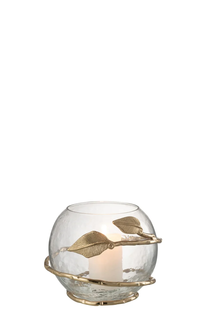De Vaas Blad Kom Glas IJzer Transparant Goud is een ronde, helder glazen kandelaar met een goudmetalen voet en decoratieve gouden bladeren aan de buitenkant, die een witte kaars binnenin vasthoudt.