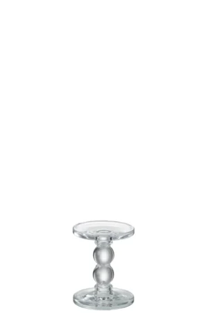 De Kaarsenhouder Druppels Glas Transparant Klein is een kleine kandelaar van helder glas met een ronde bovenkant en voet, verbonden door een korte decoratieve steel met twee bolvormen.