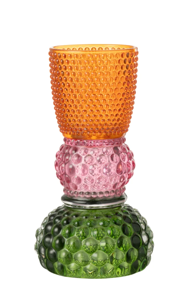 De Kaarsenhouder Jazzy Glas Mix is een kaarsenhouder van gestructureerd glas met drie op elkaar gestapelde delen: een oranje kop bovenop, een roze ronde in het midden en een brede groene basis, allemaal met verhoogde bubbelachtige patronen.