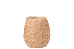 Een grote glazen kandelaar zonder steel in perzik, met een getextureerde afwerking, tegen een effen witte achtergrond.