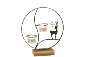 De Theelichthouder Rendier Rond Hout Zwart Naturel is een ronde metalen kandelaar met twee glazen waxinelichthouders en een silhouet van een hert, allemaal op een rechthoekige houten voet.