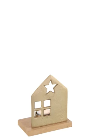 Theelichthouder Aluminium Goudkleurig: goudmetalen huisvormige waxinelichthouder met sterrenuitsparing boven vierkante vensters, op een rechthoekige houten voet.