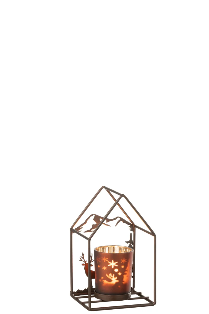 Theelichthouder Huis Glas IJzer Roestbruin Bruin: Een glazen houder met sneeuwvlok- en rendiermotief staat in een roestbruine, huisvormige ijzeren omlijsting. Het kaarslicht werpt feestelijke patronen door het glas.