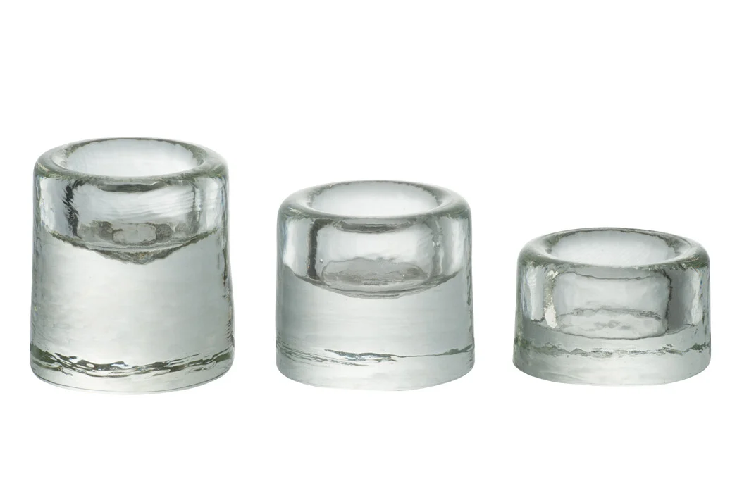 Een Theelichthouder Glas Transparant Medium kandelaar (7x7x6cm) wordt weergegeven op een witte achtergrond.