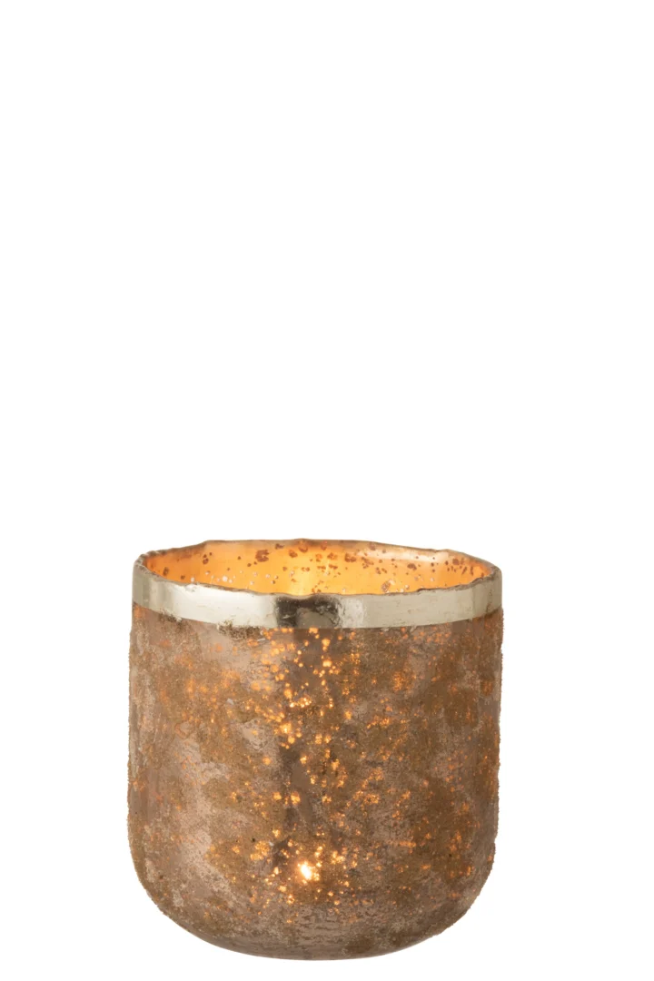 Theelichthouder Frosty Glas Oudroze Groot is een grote, gestructureerde glazen kandelaar in oudroze met een glinsterende afwerking. Als hij brandt, creëert hij een warm, gloeiend effect dat het glinsterende oppervlak prachtig benadrukt.