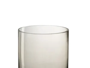 De Kaarsenhouder Orkaan Glas Beige Rond is een heldere, ronde glazen kandelaar met rechte zijden en een dikke basis, tegen een effen witte achtergrond.