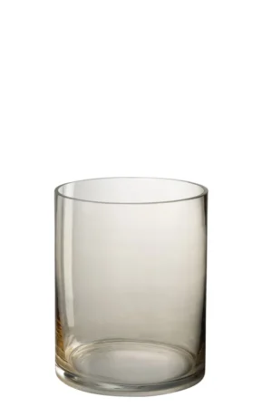 De Kaarsenhouder Orkaan Glas Beige Rond is een heldere, ronde glazen kandelaar met rechte zijden en een dikke basis, tegen een effen witte achtergrond.