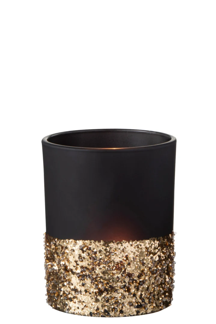 Theelichthouder Pailletten Glas Blauw Goud Medium heeft een glazen houder met blauwe en gouden pailletten voor een sprankelende look. Het bovenste gedeelte is mat, terwijl een kaars binnenin een zachte, uitnodigende gloed uitstraalt. Perfect voor feestelijke decoraties.