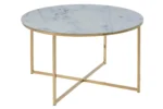 De Salontafel 80 CM Rond Kunststof is een ronde Scandinavische salontafel met een wit marmeren blad en slanke goudkleurige metalen poten in een X-vormig onderstel.