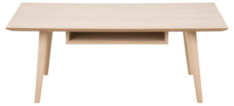 De Salontafel Wit is een ronde tafel (60 x 42 cm) gemaakt van eikenfineer, met vier schuine poten en een kleine open plank onder het tafelblad, afgebeeld vanaf de voorkant.