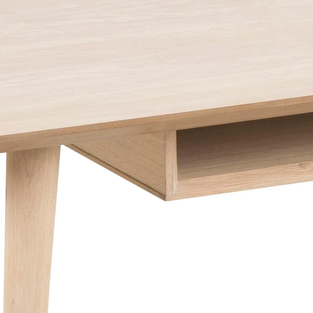 Close-up van de Salontafel Wit 60 x 42 CM Rond gemaakt met eikenfineer, met een licht houten tafelblad, een poot en een ondiep open opbergvak eronder.