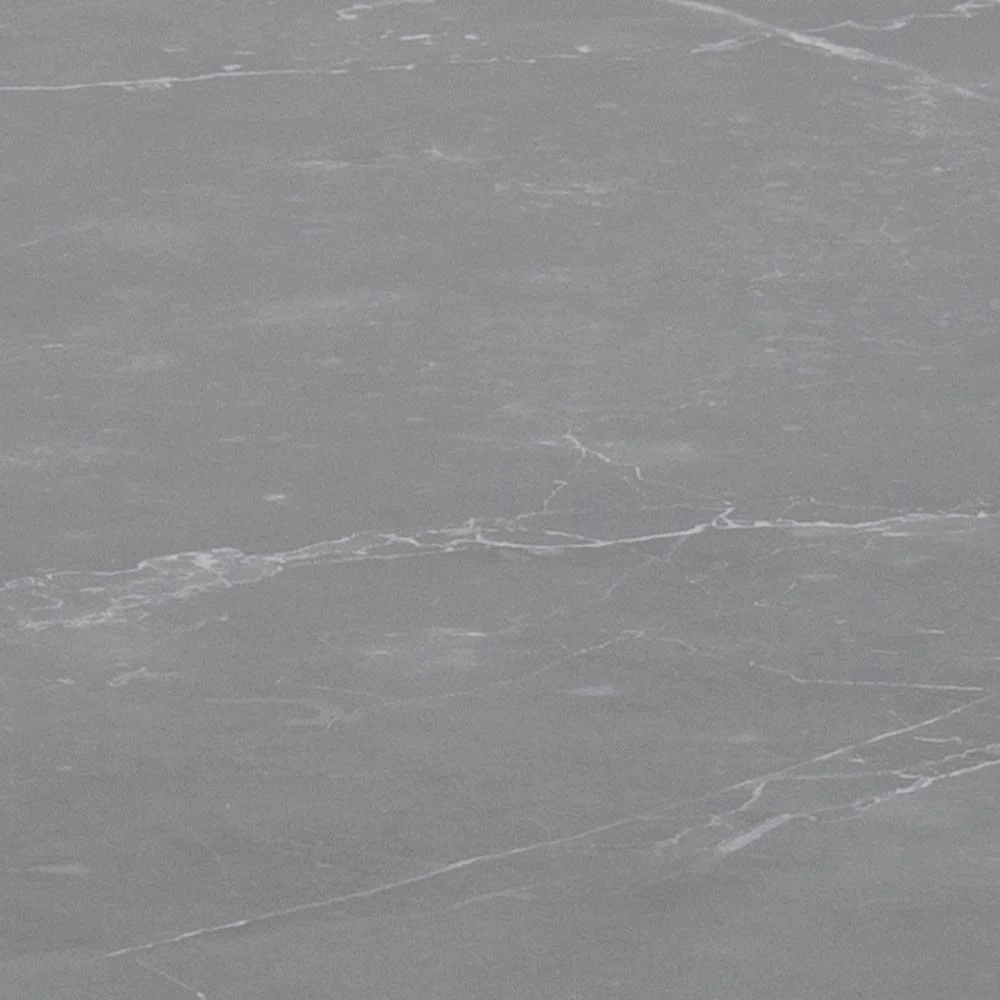 De Salontafel Zwart 77 CM Rond Kunststof heeft een glad grijs marmerachtig oppervlak met subtiele witte adering en zachte textuurvariaties.