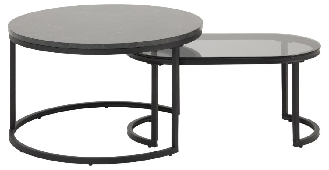 De Salontafel Rookglas set bestaat uit twee moderne in elkaar geschoven tafels met een zwart metalen onderstel: een ronde tafel met een donker massief blad en een kleinere ovale tafel met een donker glazen blad, die gedeeltelijk in elkaar geschoven kunnen worden onder de grotere tafel.