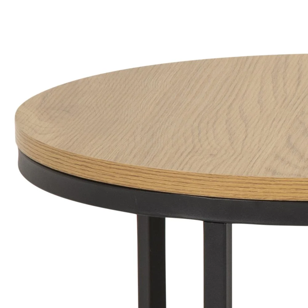 Close-up van de Salontafel Rond Kunststof met een rond tafelblad in lichte afwerking en zwarte metalen verticale poten.