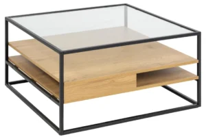 De Salontafel Zwart 80 x 40 CM Vierkant is een moderne vierkante salontafel met een zwart metalen frame, een helder glazen blad en twee houten planken voor opslag. Het minimalistische ontwerp zorgt voor zowel stijl als functionaliteit. Gemaakt van kunststof met.