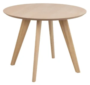 De Eettafel Townsville 100 CM Rond Eikenhout is een ronde, licht eiken tafel met vier schuine poten tegen een effen witte achtergrond.