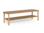 De Salontafel Roest is een ronde salontafel (134 x 34 cm) gemaakt van eikenfineer, met afgeronde hoeken, vier rechte poten en een open onderste plank onder het tafelblad.