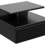 Het Nachtkastje Zwart MDF Slaapkamer is een minimalistisch zwart wandnachtkastje met strakke lijnen, voorzien van één lade en een open schap erboven - perfect voor moderne slaapkamers.