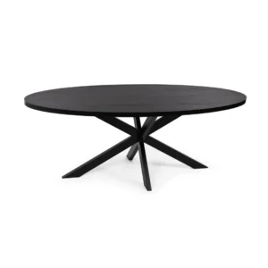 De Stalux Ovale eettafel 'Mees' (180 x 100cm) in zwart/zwart eiken is een moderne ovale tafel met een glad blad en een kenmerkende kruisvoet met schuine poten.