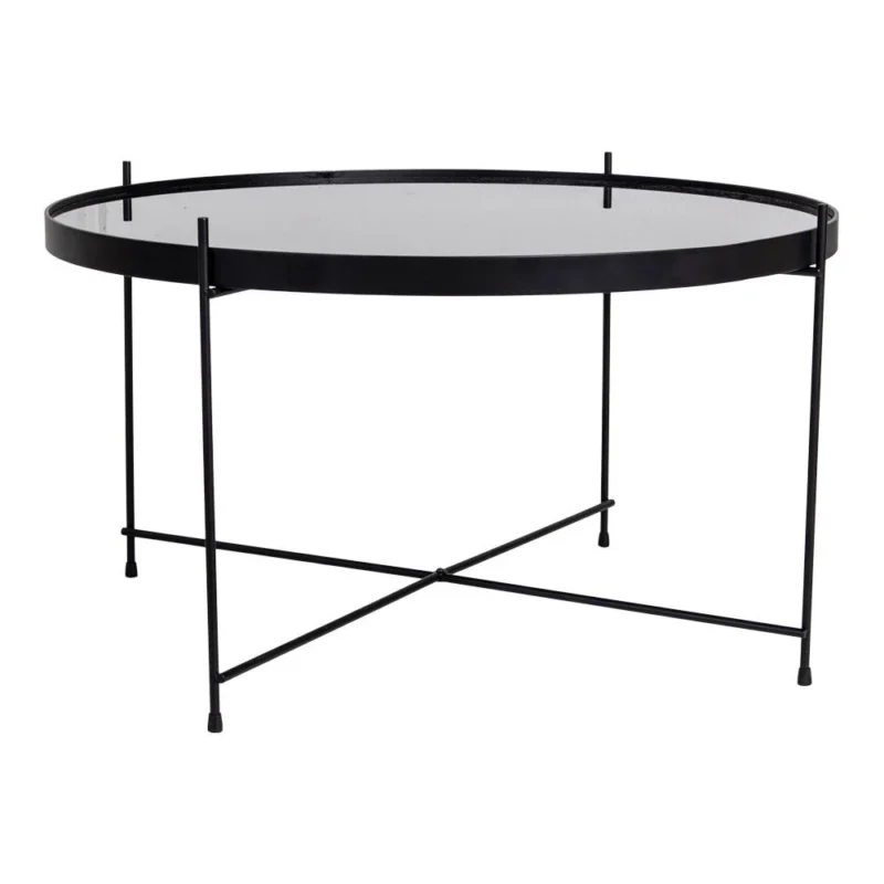 De Salontafel Zwart 70 x 40 CM Rond Staal heeft een rond blad van helder glas, een dun zwart metalen frame met een opstaande rand en vier slanke poten die verbonden zijn door een X-vormige steun aan de onderkant.