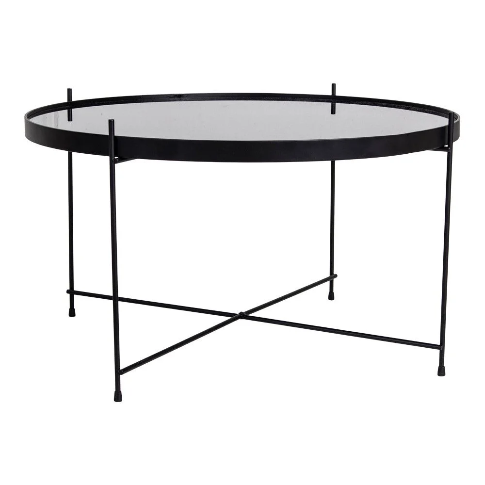 De Salontafel Zwart 70 x 40 CM Rond Staal heeft een rond blad van helder glas, een dun zwart metalen frame met een opstaande rand en vier slanke poten die verbonden zijn door een X-vormige steun aan de onderkant.
