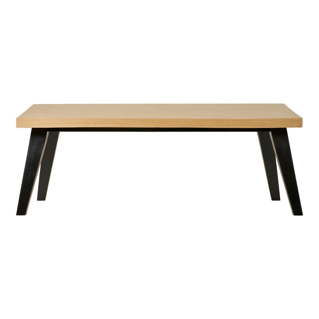 De Salontafel Zwart is een rechthoekige glazen tafel (60 x 42 cm) met een lichtgekleurd blad en vier schuine zwarte poten, tegen een effen witte achtergrond.