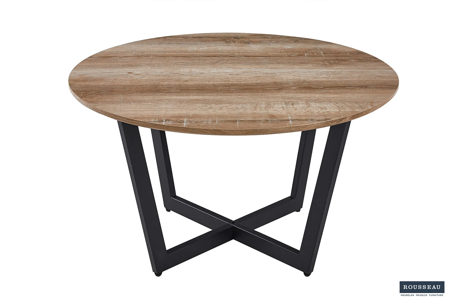 De Salontafel Compact Klassiek heeft een rond, lichtbruin gestructureerd houten blad en zwarte metalen poten in een kruisende X-vorm. Het Rousseau logo staat rechtsonder.