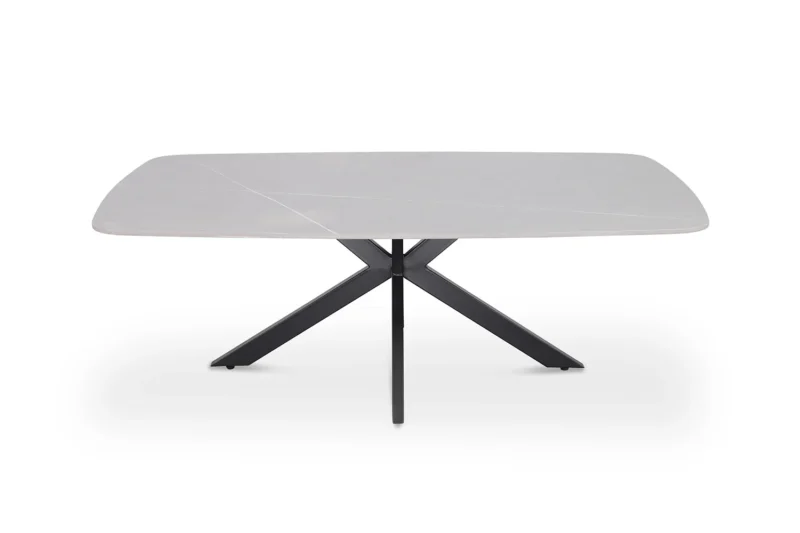 Een klassieke ovale salontafel, Salontafel Grijs 130 CM Ovaal Steen, met een lichtgrijs stenen blad en zwart gekruiste metalen poten, tegen een witte achtergrond.