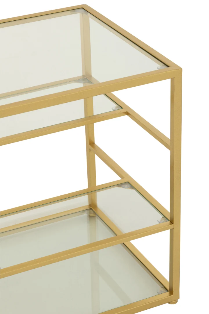 Een close-up van de Bijzettafel ijzer/glas goudkleurig toont het goud metalen frame, de drie transparante glazen planken en het strakke moderne ontwerp.