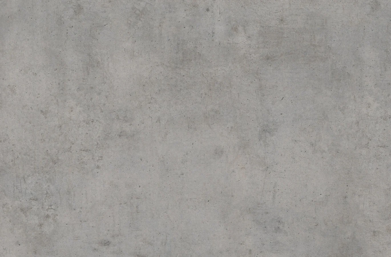 Een close-up van de Schakel eettafel rechthoekig 200X100 Beton + Stellar heeft een lichtgrijs betonnen oppervlak met subtiele textuur, vage vlekken, spikkels en natuurlijke kleurvariaties.