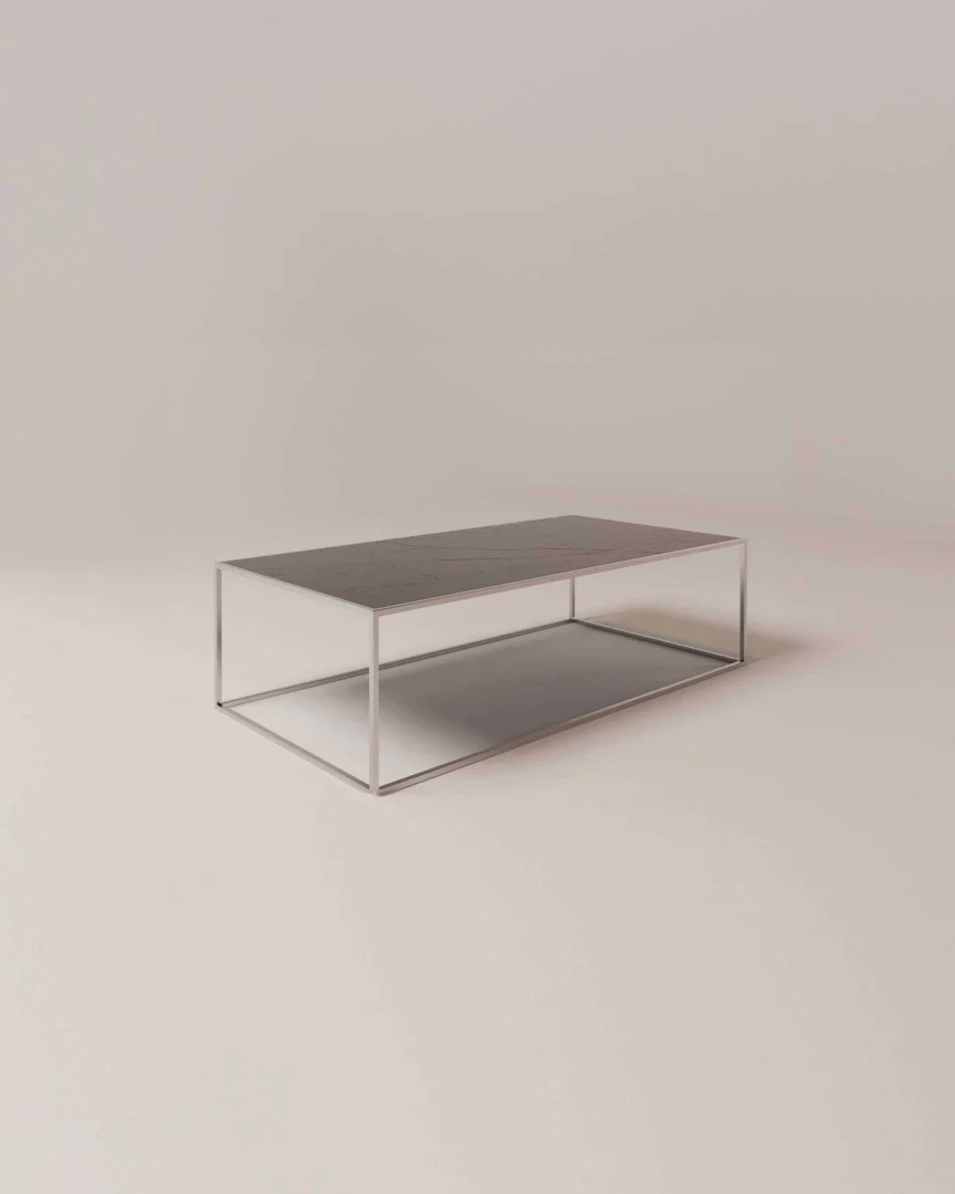 De Salontafel Zilver, Roest (73 x 40 CM) is een minimalistische rechthoekige salontafel met een slank metalen frame en een plat oppervlak, afgebeeld op een lichtgekleurde vloer tegen een effen achtergrond.