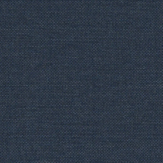 Close-up van donkerblauwe stof voor een boxspring. De textuur is duidelijk zichtbaar, met een subtiel weefpatroon. Neutraal licht.