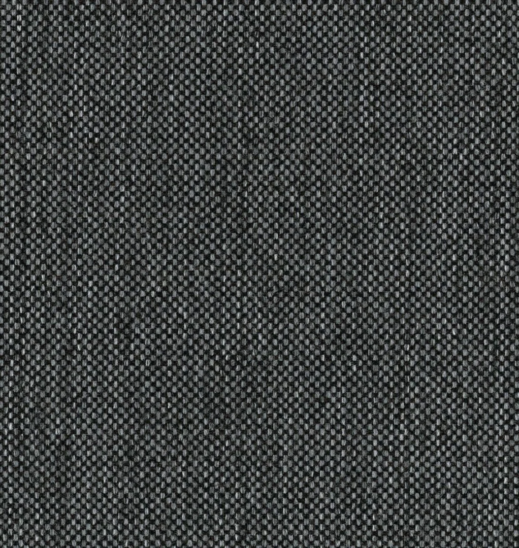 Detailopname van de grijze stof van een boxspring. De stof heeft een fijne, geweven textuur. Het materiaal oogt zacht en comfortabel.