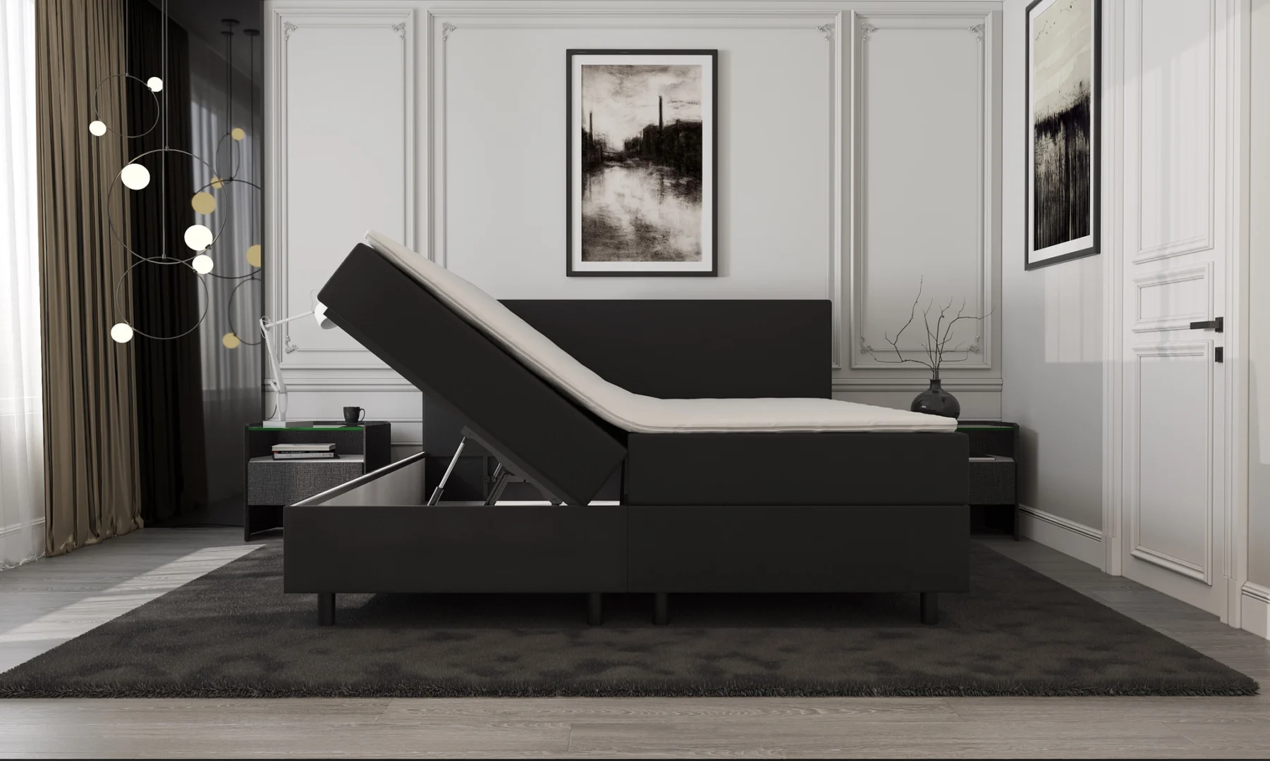 Zwarte boxspring met opbergruimte in een lichte kamer. Het bed is gedeeltelijk opengeklapt en heeft een donker vloerkleed.