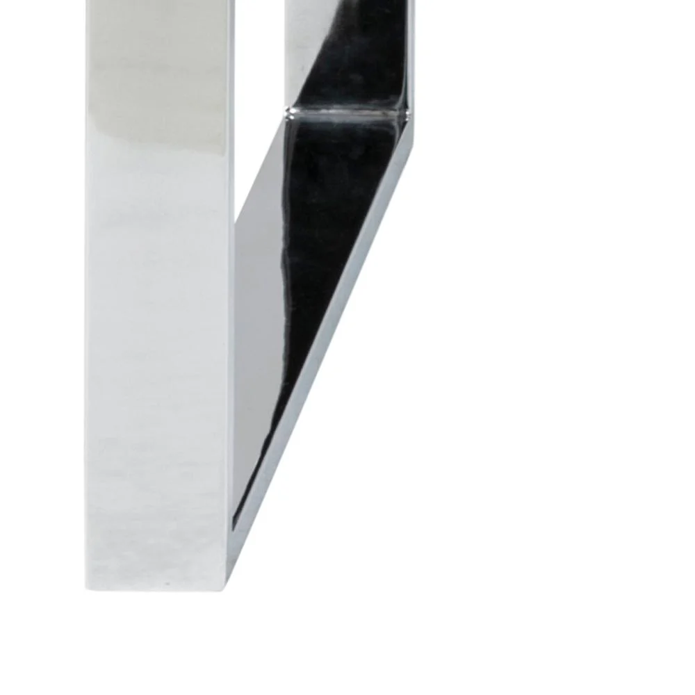 Close-up van de Salontafel Transparant Rechthoek Glas met een glanzende metalen poot en modern hoekig ontwerp, tegen een effen witte achtergrond.