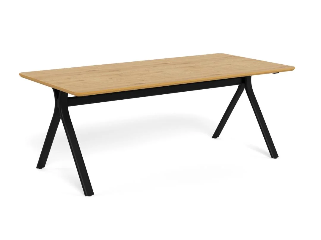 De Eettafel Bristol 100 x 75 CM Rechthoek heeft een MDF rechthoekig lichtbruin blad en naar buiten gebogen zwarte metalen poten, tegen een effen witte achtergrond.