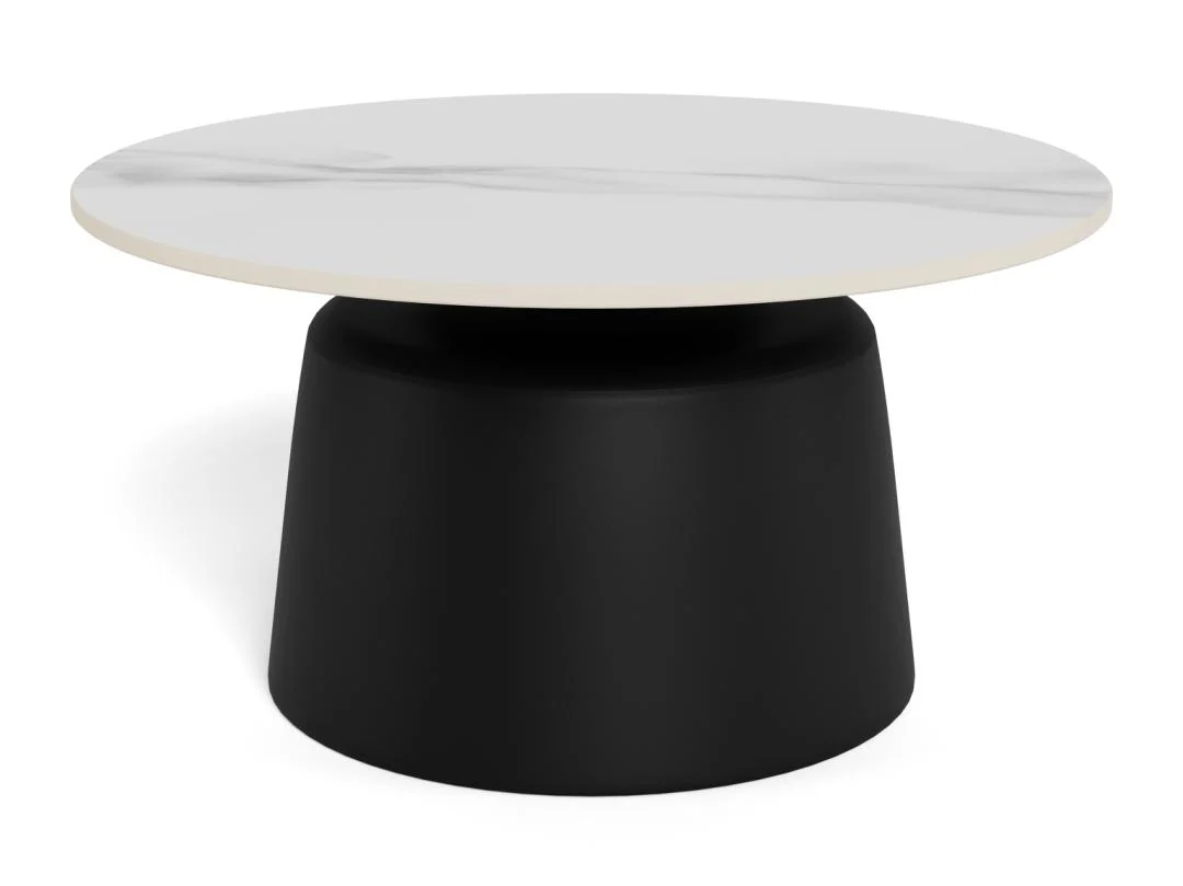 De Salontafel Zwart, Wit 70 CM Rond is een moderne salontafel met een rond wit blad en een breed zwart onderstel, gemaakt van kunststof voor een minimalistische, eigentijdse look.