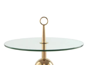 De Bijzettafel Staal Compact is een moderne bijzettafel met een rond glazen blad, een goud metalen onderstel en een centrale gouden stang met een ronde handgreep bovenop.