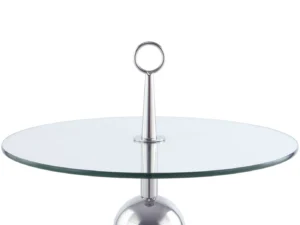 De Bijzettafel Transparant, Zilver Staal is een moderne ronde glazen tafel met een zilver metalen onderstel, voorzien van een centrale paal met een ronde handgreep.