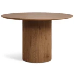 De Nora Eettafel - Ø120cm Walnoot is een ronde houten tafel met een dik cilindrisch onderstel en een glad, vlak tafelblad, tegen een effen witte achtergrond.