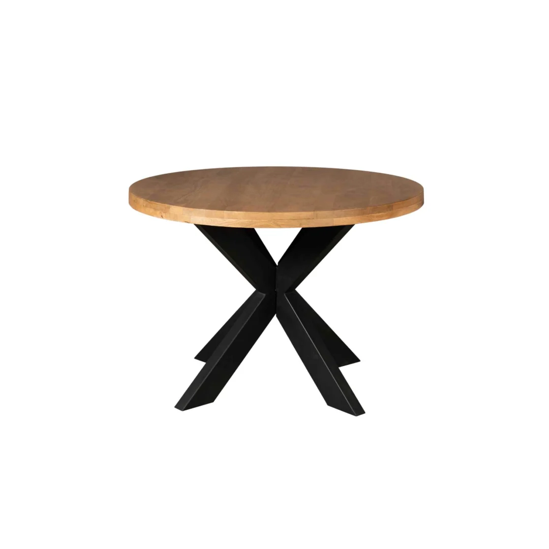 De Eettafel Denver is een ronde eettafel met een lichtbruin mangohout blad en een zwart metalen X-vormig onderstel, met een diameter van 110 cm, tegen een effen witte achtergrond.