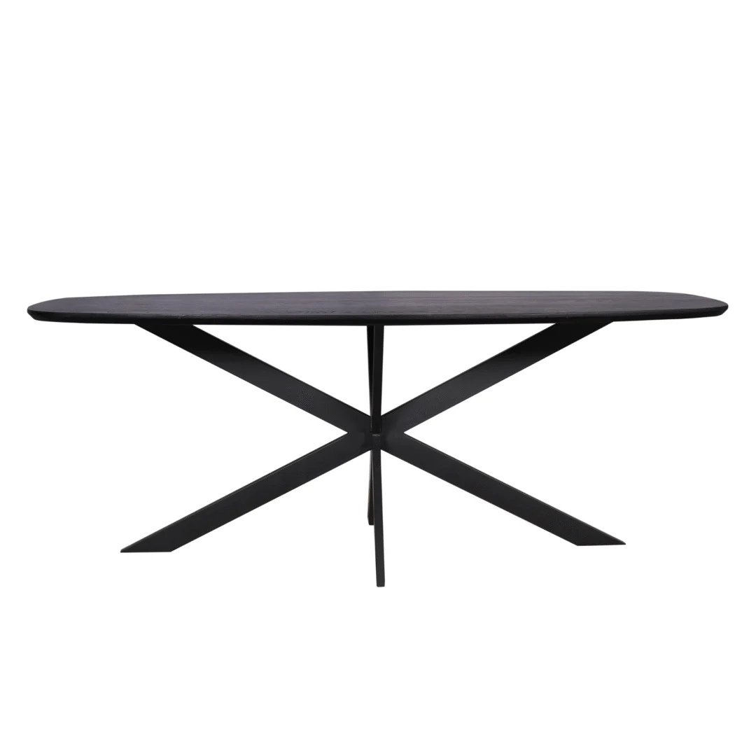 De Eiken eettafel Ferris | Deens Ovaal 200 cm | Zwart is een moderne eettafel met een donker ovaal houten blad en een opvallend zwart metalen onderstel met vier schuine poten die elkaar in het midden kruisen.