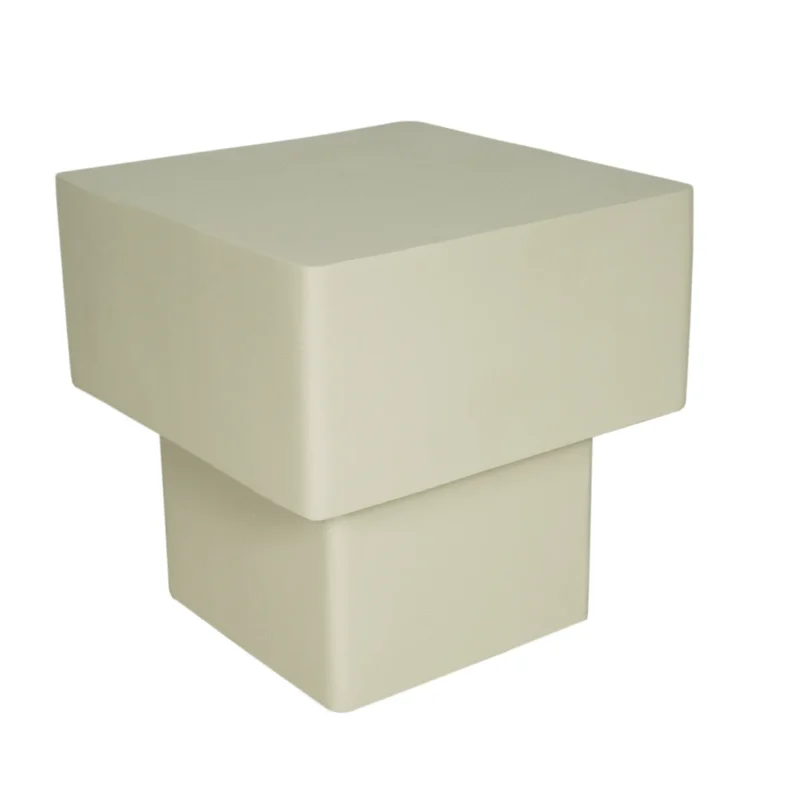 De Salontafel 57 x 52 CM Vierkant is een minimalistische vierkante beige tafel met een dik blad, een kleiner vierkant onderstel, gladde afgeronde hoeken en een modern geometrisch ontwerp.