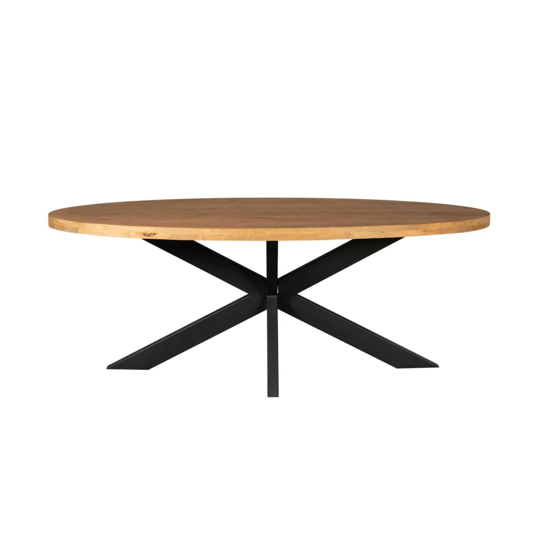 De Eettafel Denver is een ovale mangohout eettafel van 210 cm met een dik blad en een modern zwart metalen X-vormig onderstel, tegen een witte achtergrond.