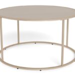Studio shot of a light gray round coffee table, featuring a Kunststof top, minimalist metal frame, and bright, even lighting. Elegant home furniture.