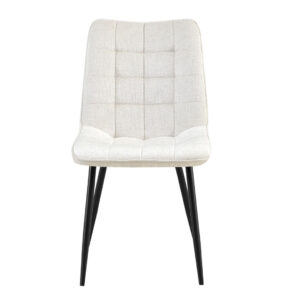 Eetkamerstoel Lucille: beige stoffen stoel met zwarte poten.