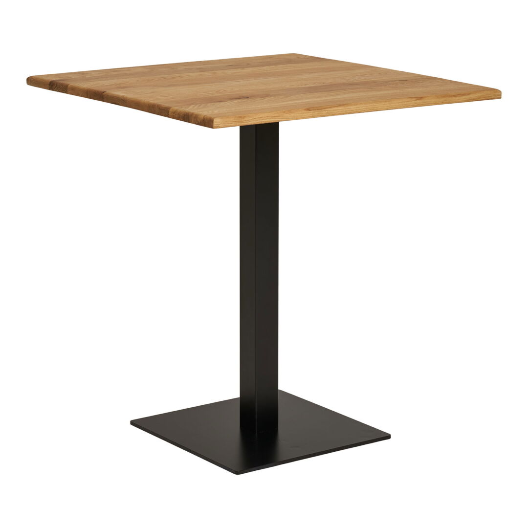 Square Lignano dining table featuring a light brown wooden top with visible wood grain and a sturdy black metal base, gefotografeerd in vogelperspectief.