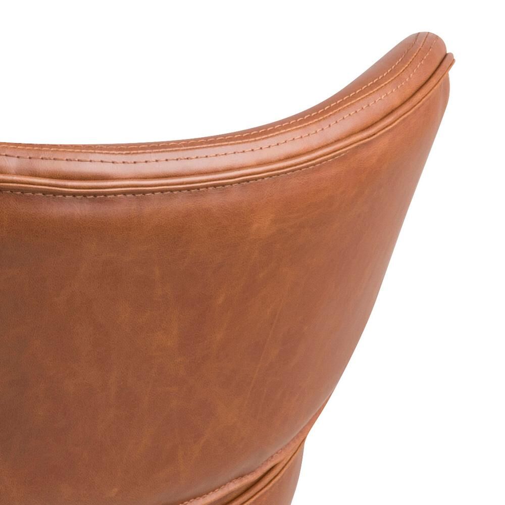 Detail van de bruine lederen rugleuning van de Cazar loungestoel.