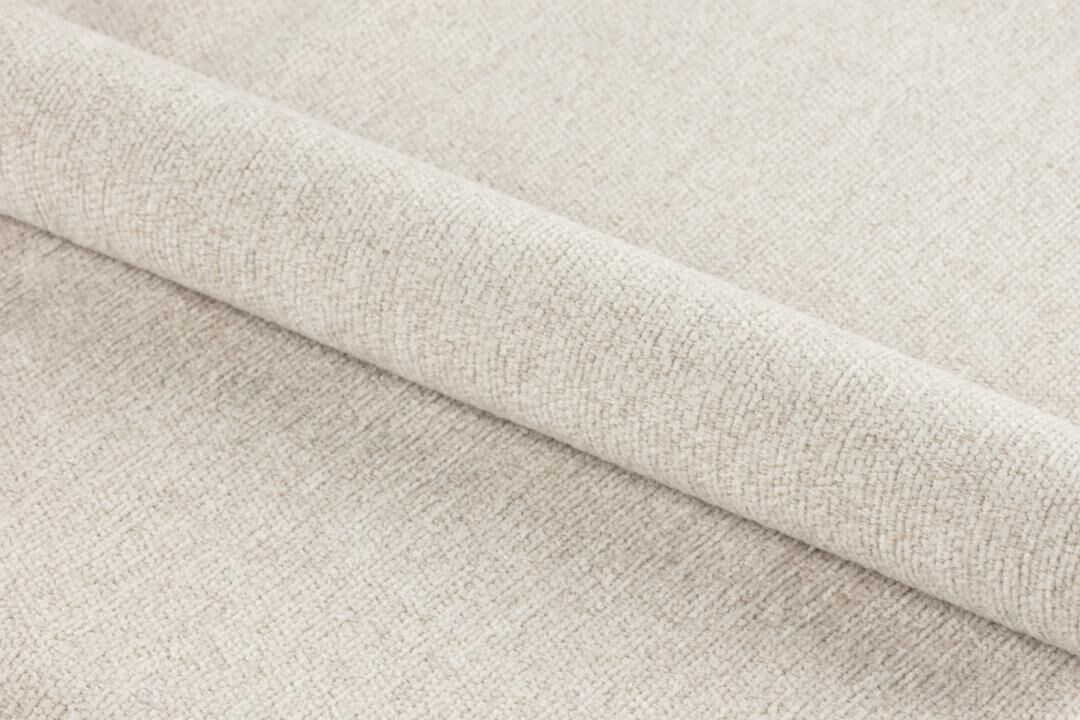 Stofstaal voor Lucy eetkamerstoel: beige textuur.