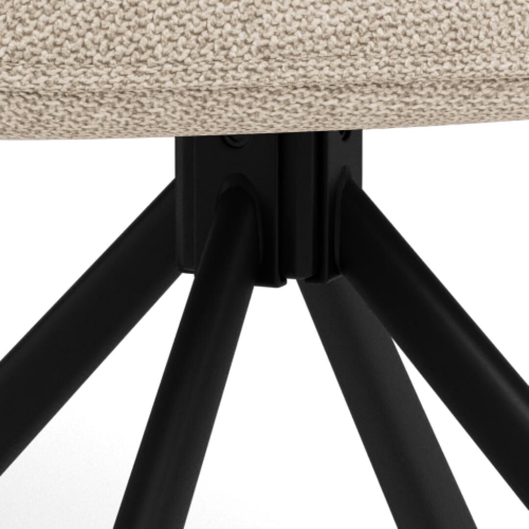 Glenda eetkamerstoel: Detailopname van het zwarte metalen onderstel met beige stoffen zitting.